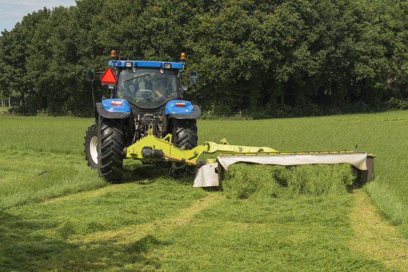 Farm Mowing Machinery in Use